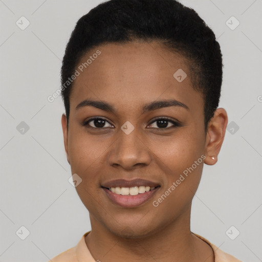 Joyful black young-adult female with short  black hair and brown eyes