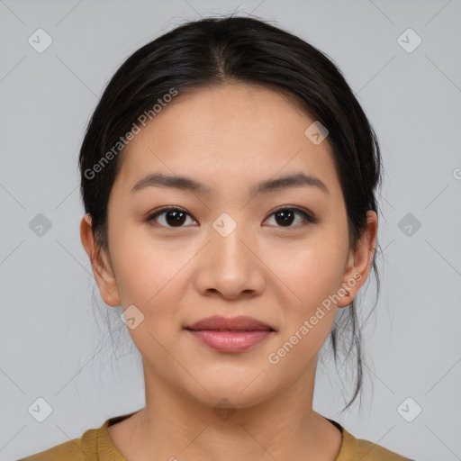 Joyful white young-adult female with medium  black hair and brown eyes