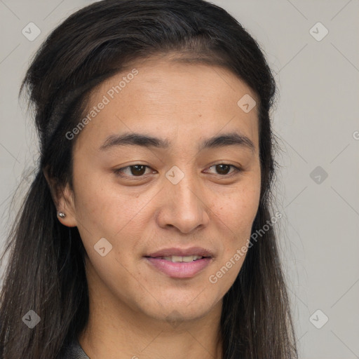 Joyful latino young-adult female with long  brown hair and brown eyes