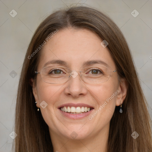 Joyful white adult female with long  brown hair and grey eyes