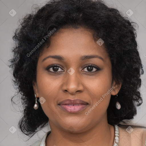 Joyful black young-adult female with long  brown hair and brown eyes