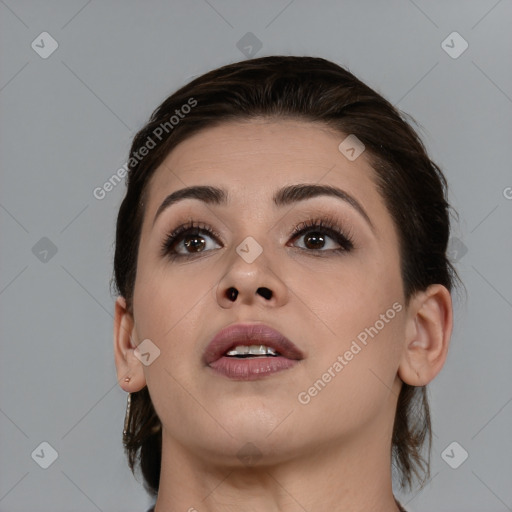 Neutral white young-adult female with medium  brown hair and brown eyes