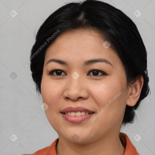 Joyful asian young-adult female with medium  brown hair and brown eyes