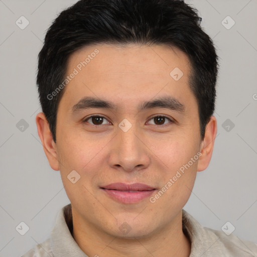 Joyful asian young-adult male with short  brown hair and brown eyes