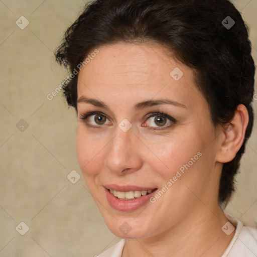 Joyful white adult female with short  brown hair and brown eyes