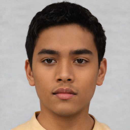 Neutral latino child male with short  black hair and brown eyes