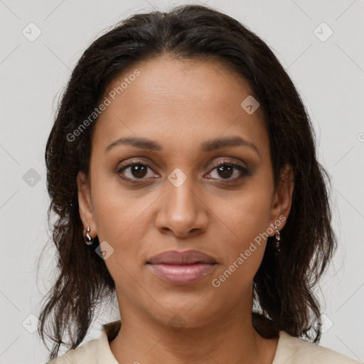 Joyful black young-adult female with medium  brown hair and brown eyes