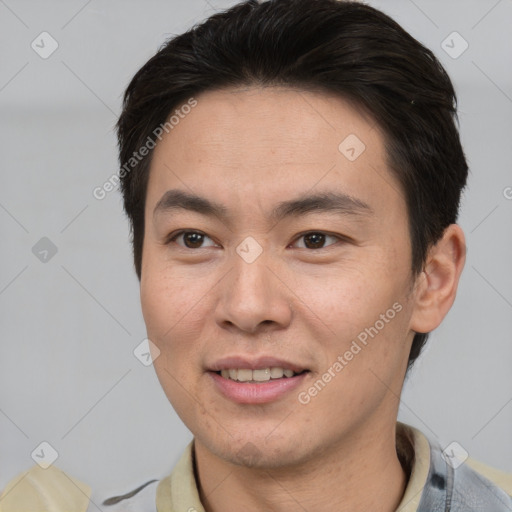 Joyful asian young-adult male with short  brown hair and brown eyes