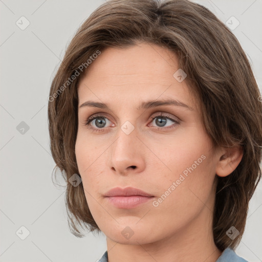 Neutral white young-adult female with medium  brown hair and grey eyes