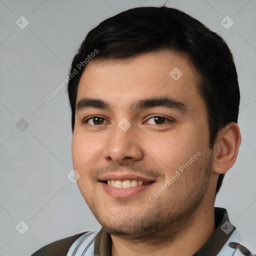 Joyful white young-adult male with short  black hair and brown eyes