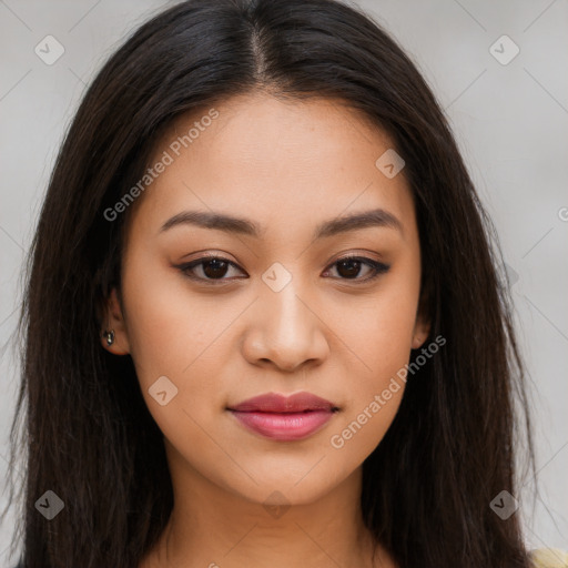 Joyful latino young-adult female with long  brown hair and brown eyes