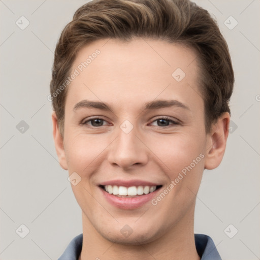 Joyful white young-adult female with short  brown hair and grey eyes