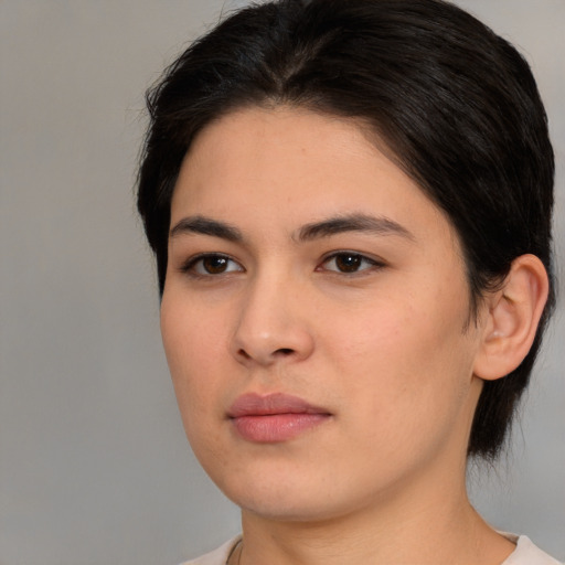 Neutral white young-adult female with medium  brown hair and brown eyes