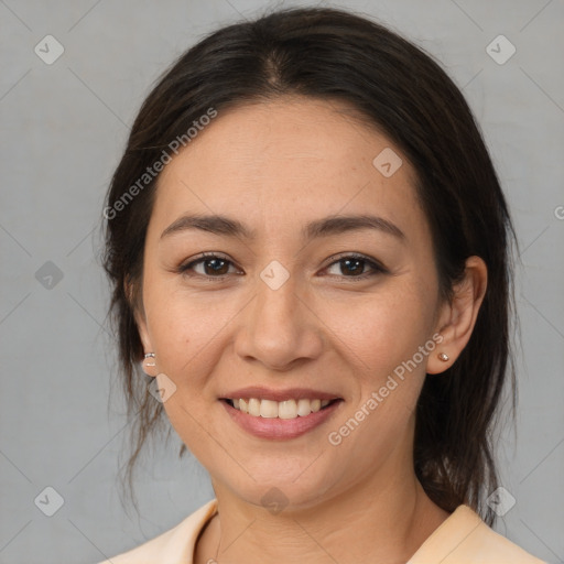 Joyful asian young-adult female with medium  brown hair and brown eyes