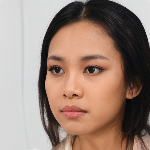Neutral asian young-adult female with long  black hair and brown eyes