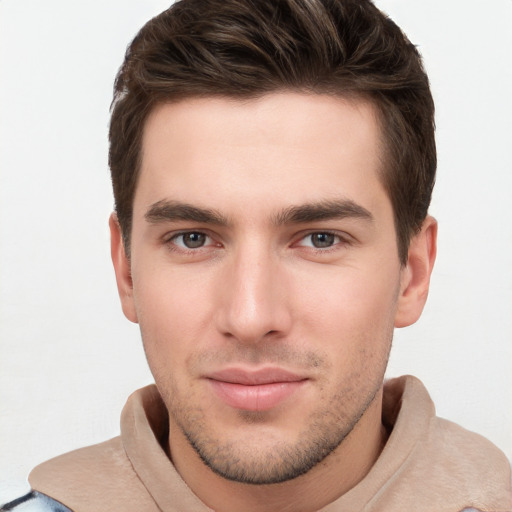 Neutral white young-adult male with short  brown hair and brown eyes