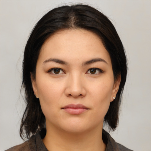 Neutral white young-adult female with medium  brown hair and brown eyes