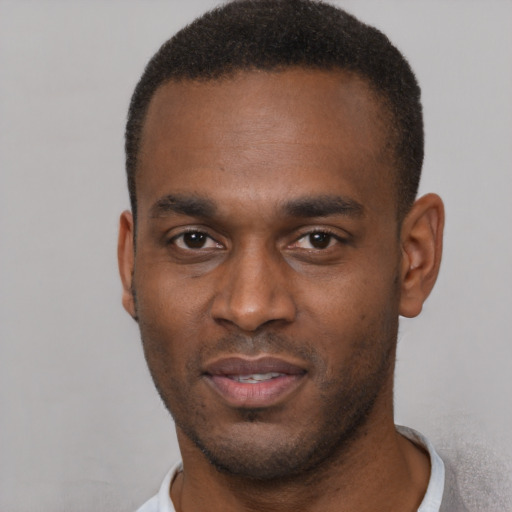 Neutral black young-adult male with short  brown hair and brown eyes