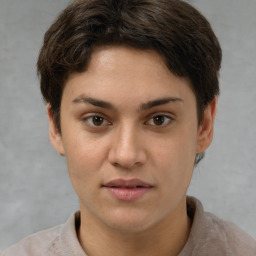 Neutral white young-adult female with short  brown hair and brown eyes