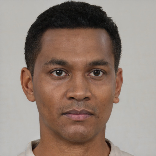 Neutral black young-adult male with short  black hair and brown eyes