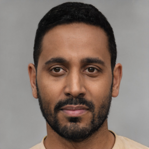 Neutral black young-adult male with short  black hair and brown eyes