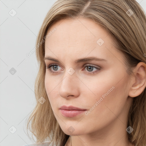 Neutral white young-adult female with long  brown hair and grey eyes