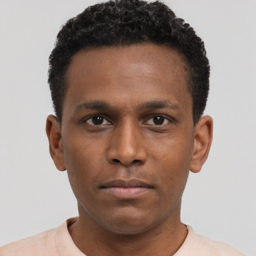 Neutral black young-adult male with short  brown hair and brown eyes