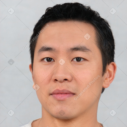 Neutral asian young-adult male with short  black hair and brown eyes