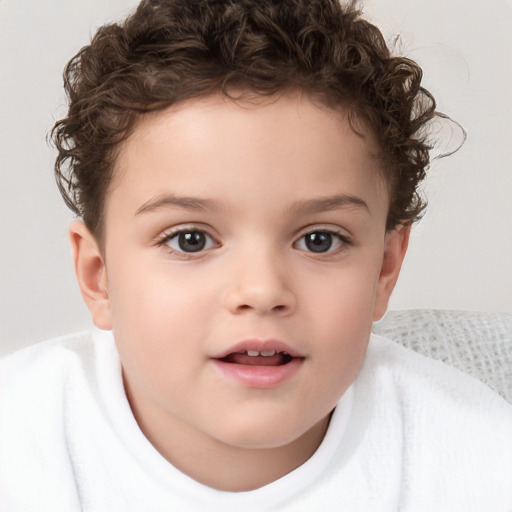 Joyful white child female with short  brown hair and brown eyes