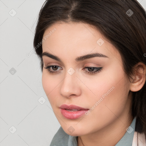 Neutral white young-adult female with medium  brown hair and brown eyes