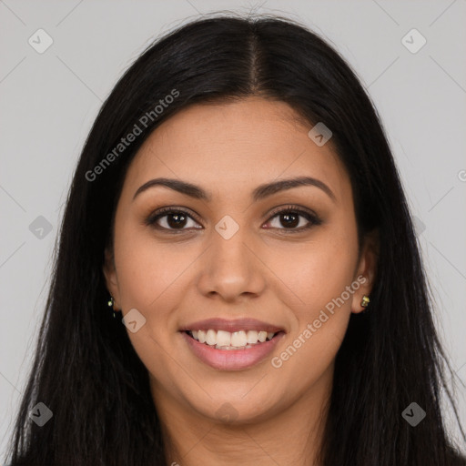 Joyful latino young-adult female with long  brown hair and brown eyes