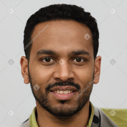 Joyful black young-adult male with short  black hair and brown eyes