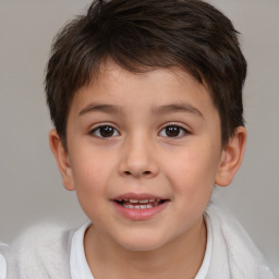 Joyful white child male with short  brown hair and brown eyes