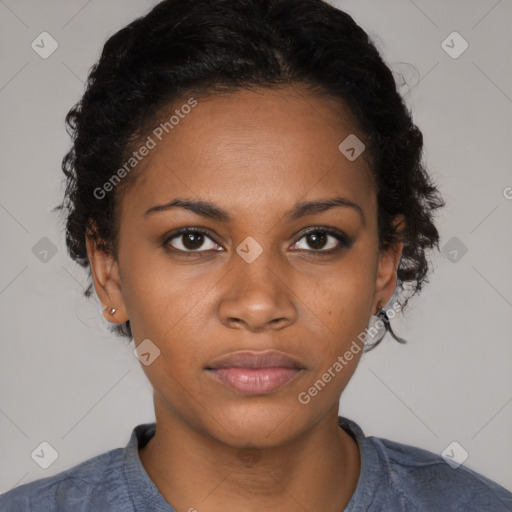 Joyful black young-adult female with medium  black hair and brown eyes