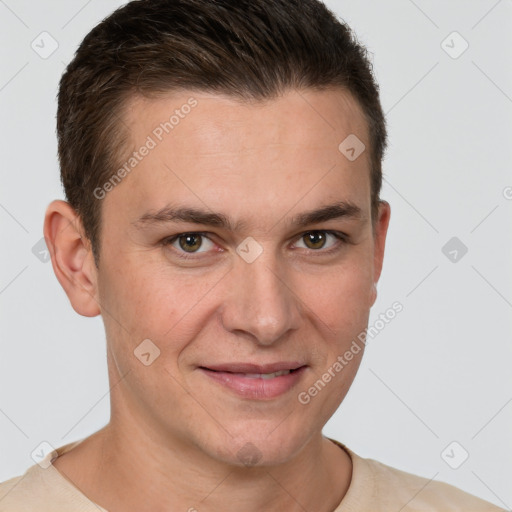 Joyful white young-adult male with short  brown hair and grey eyes
