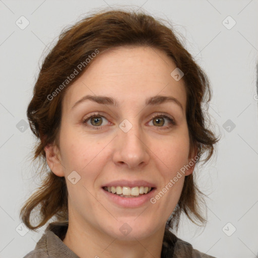 Joyful white young-adult female with medium  brown hair and green eyes