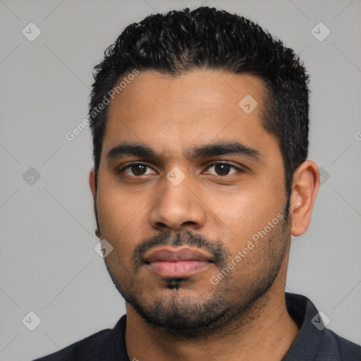 Neutral latino young-adult male with short  black hair and brown eyes
