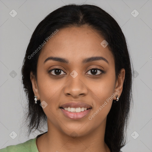 Joyful latino young-adult female with long  black hair and brown eyes