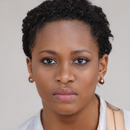 Neutral black young-adult female with short  brown hair and brown eyes