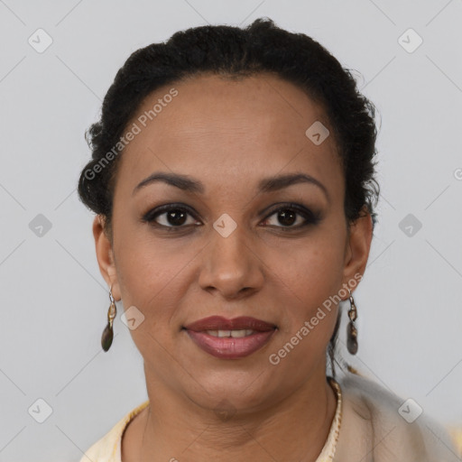 Joyful latino adult female with short  brown hair and brown eyes