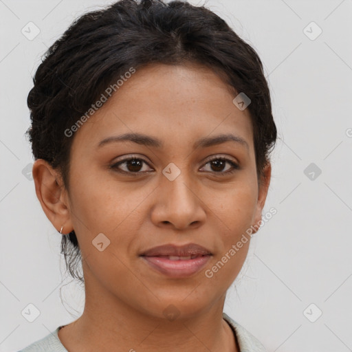 Joyful latino young-adult female with short  brown hair and brown eyes