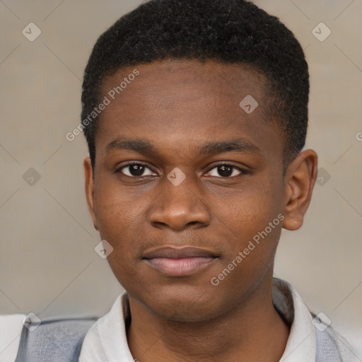 Joyful black young-adult male with short  brown hair and brown eyes