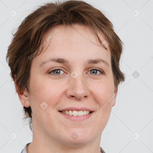 Joyful white adult female with medium  brown hair and grey eyes