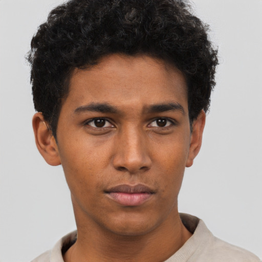 Neutral black young-adult male with short  brown hair and brown eyes