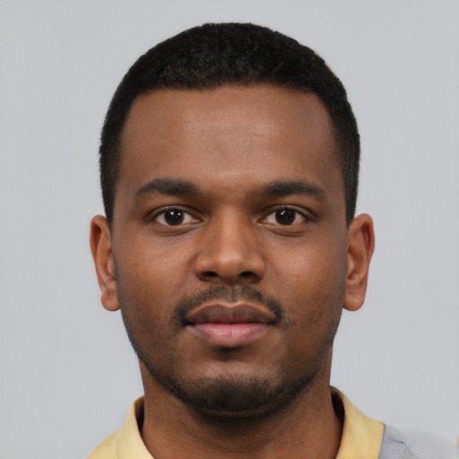 Neutral black young-adult male with short  black hair and brown eyes
