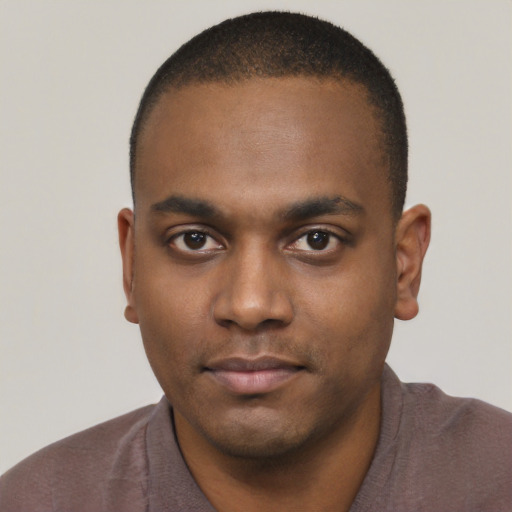 Neutral black young-adult male with short  black hair and brown eyes