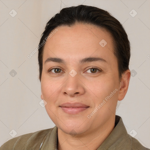 Joyful white young-adult female with short  brown hair and brown eyes