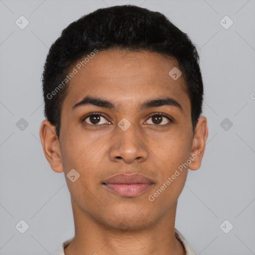 Joyful latino young-adult male with short  brown hair and brown eyes