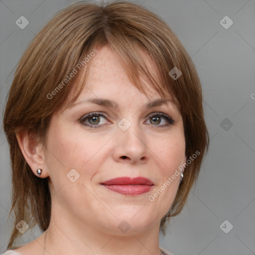 Joyful white adult female with medium  brown hair and grey eyes