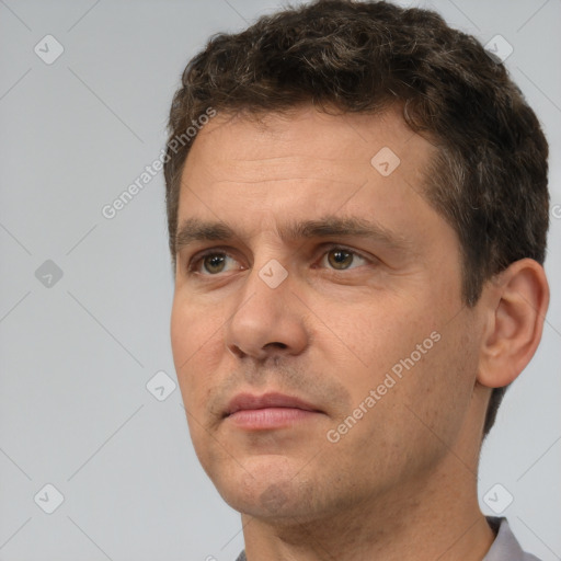 Neutral white adult male with short  brown hair and brown eyes